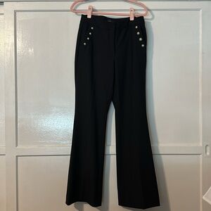 Black bootcut trousers with metal detail